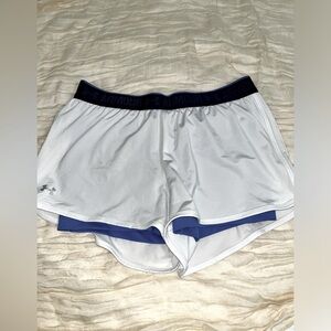 White under armour shorts with built in blue shorts
